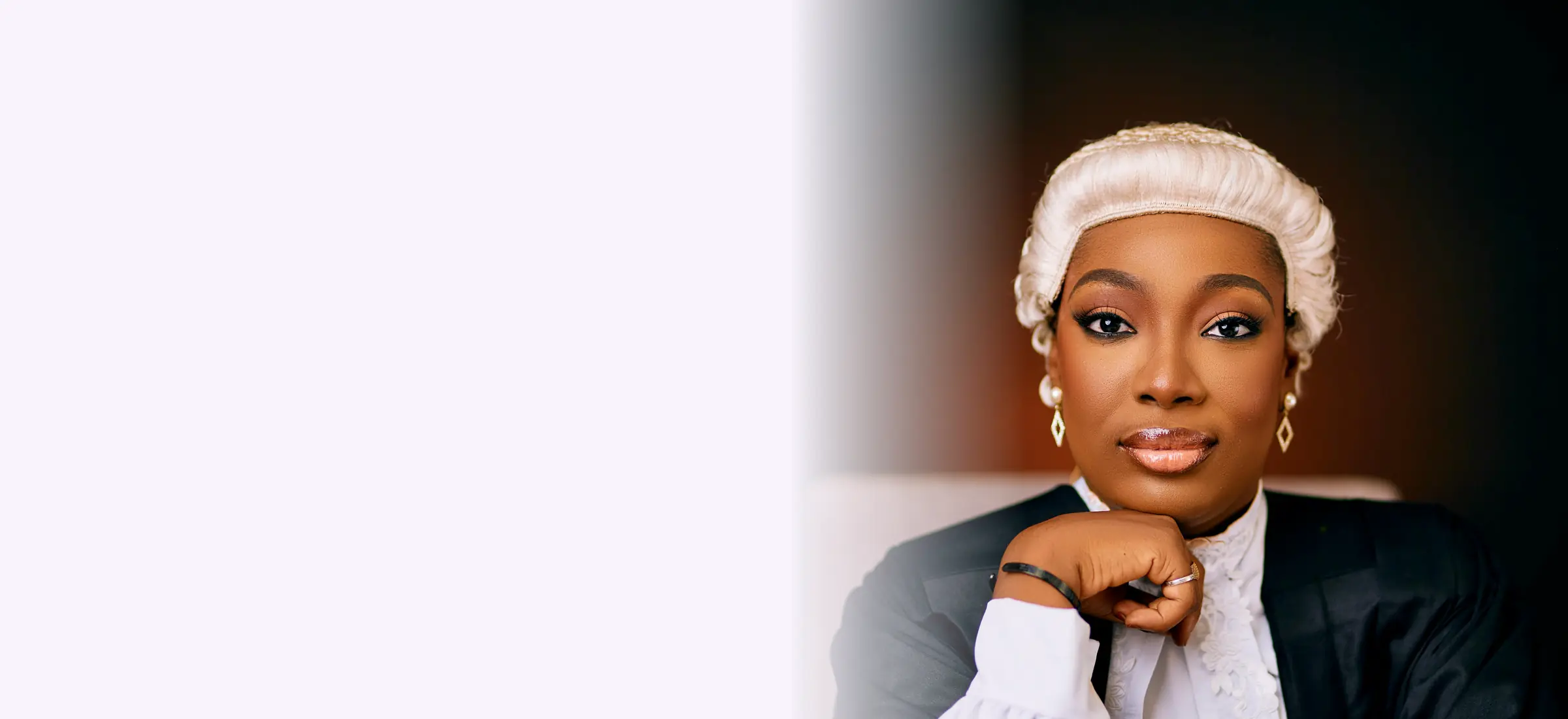 A Kenyan advocate in wig and gown, covered by professional indemnity insurance for advocates