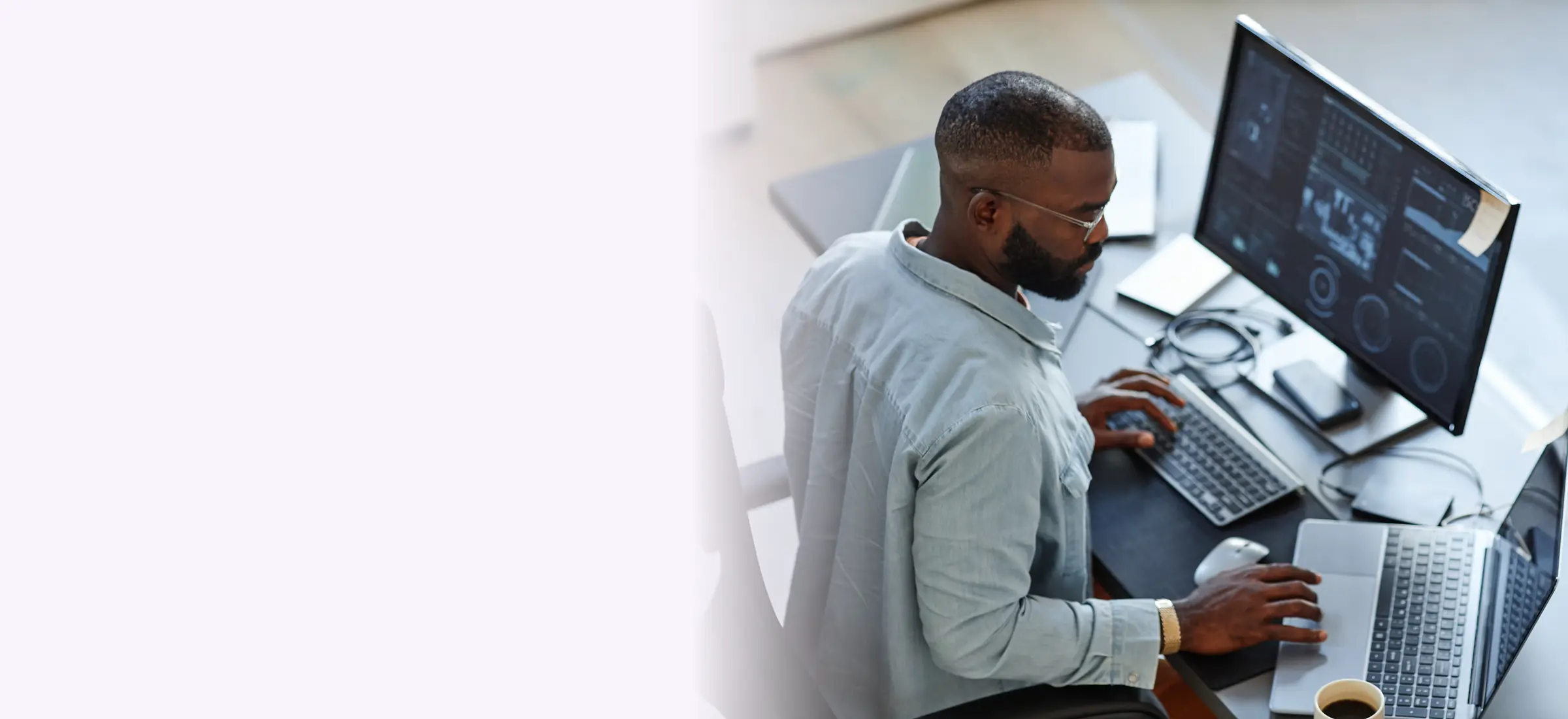 A software developer working at his desk