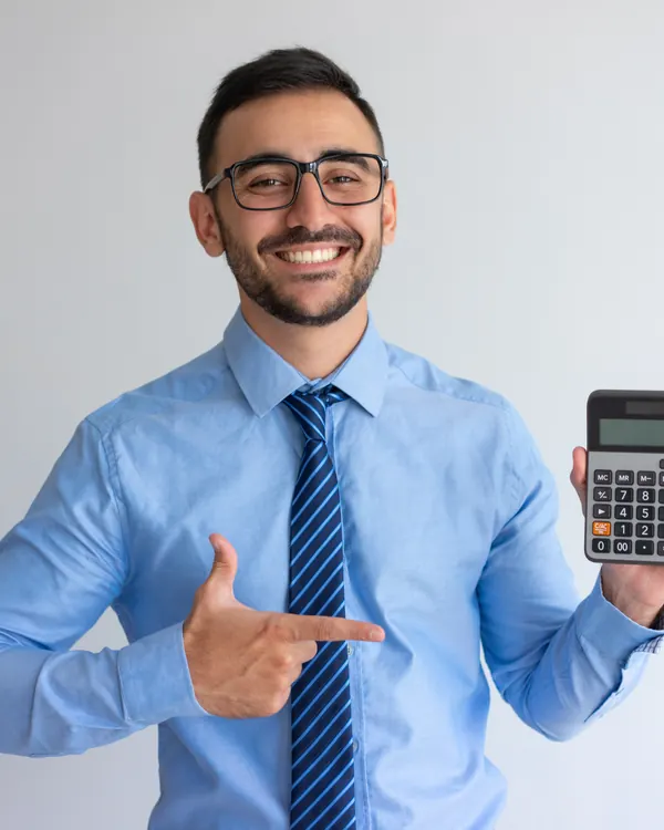 An accountant holding a calculator